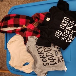 Bundles of baby clothes